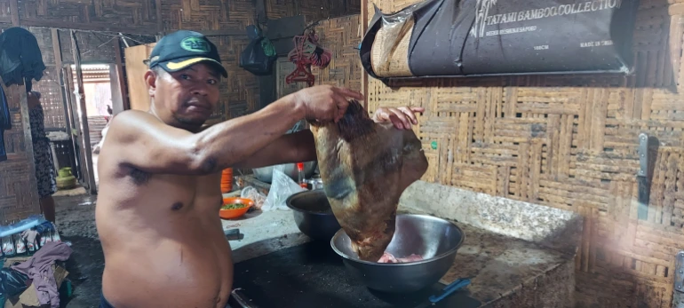 Lau Dimbo Simalem restaurant sells grilled dog, dog soup, and dog curry [Courtesy of Aisyah Llewellyn]