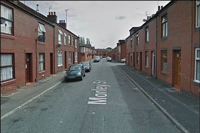 Greater Manchester Police were called to Morley Street in Rochdale (pictured) after the dog went on the rampage